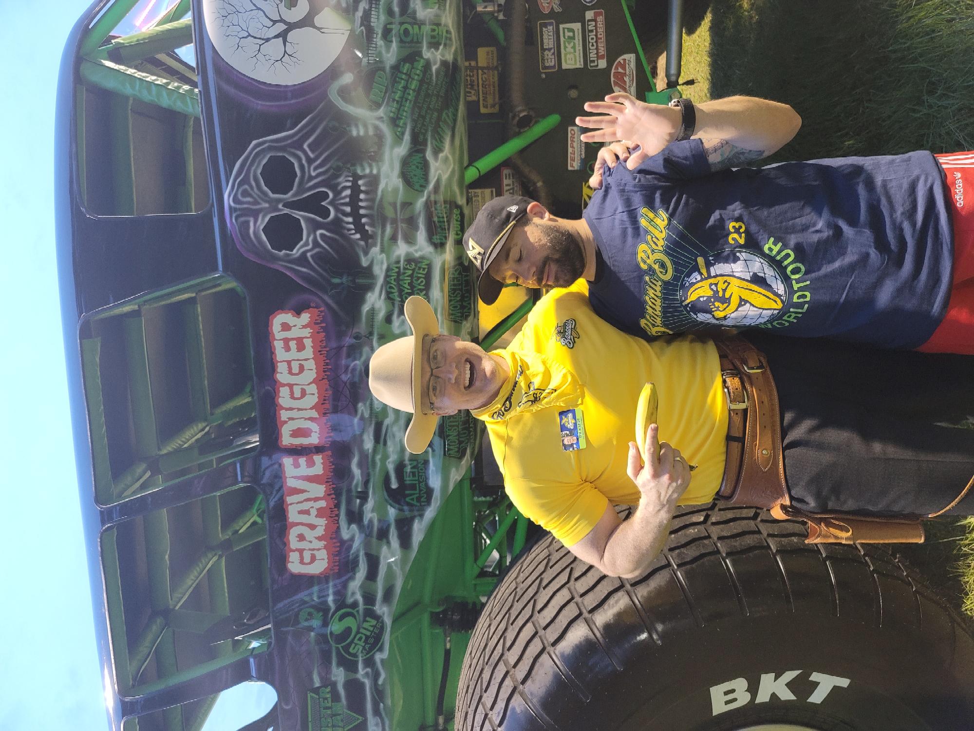 Tim Naddy and his son in front of the Grave Digger monster truck